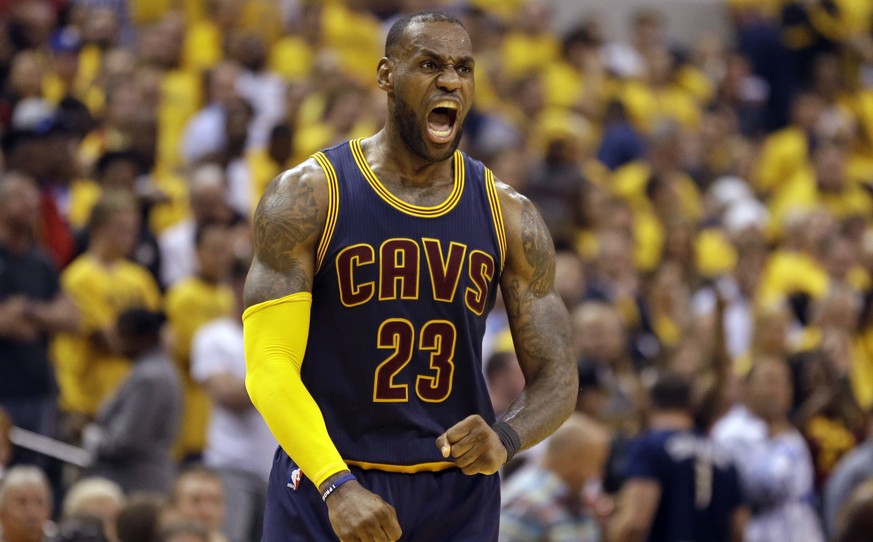 FILE - In this April 20, 2017, file photo, Cleveland Cavaliers forward LeBron James celebrates a basket against the Indiana Pacers during the second half of Game 3 of a first-round NBA basketball play ...