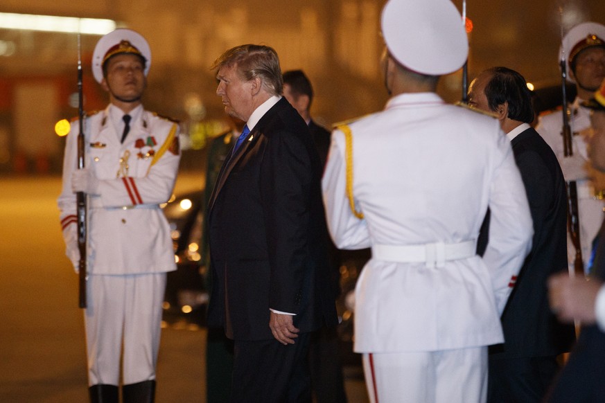 U.S President Donald Trump arrives at Noi Bai Airport before a summit with North Korean leader Kim Jong Un, Tuesday, Feb. 26, 2019, in Hanoi. (AP Photo/ Evan Vucci)