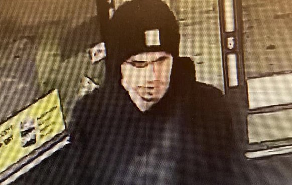 This surveillance video image released by the Yakima Police Department shows a suspect sought in a shooting at a convenience store in Yakima, Wash., early on Tuesday, Jan. 24, 2023. At least three peo ...