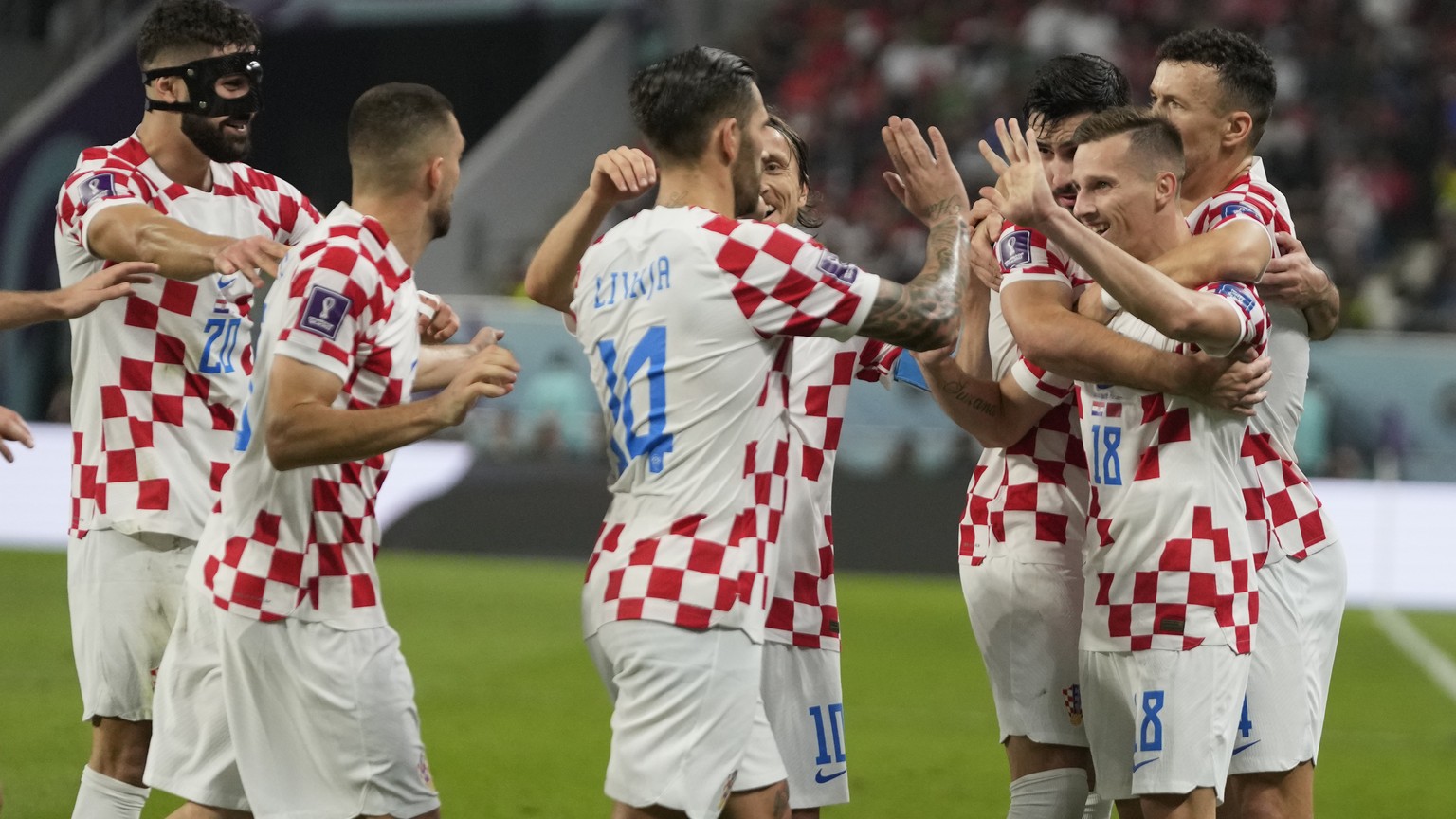 Croat players celebrate after a goal during the World Cup third-place playoff soccer match between Croatia and Morocco at Khalifa International Stadium in Doha, Qatar, Friday, Dec. 16, 2022. (AP Photo ...