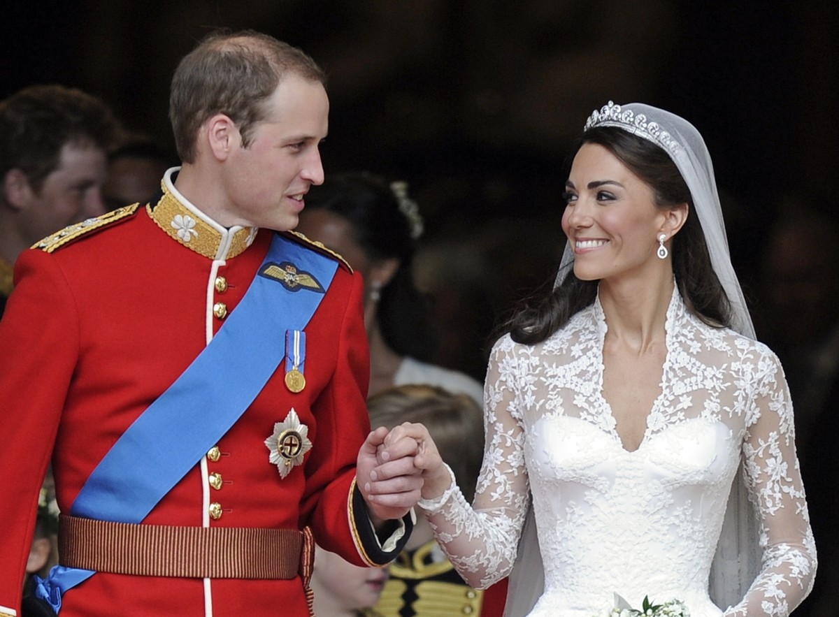 FILE - Britain's Prince William and his wife Kate, Duchess of Cambridge stand outside Westminster Abbey after their Royal Wedding in London, April 29, 2011. The Duchess of Cambridge, who turns 40 ...