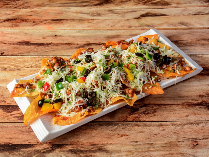 Cheesy Nachos tortilla chips cheese guacamole bar food food food cooking
