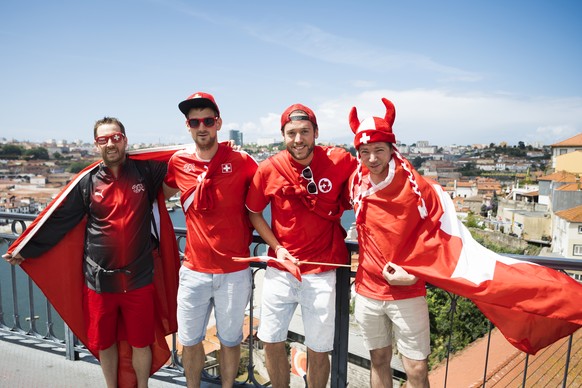 Supporters from Switzerland pose in the street before the UEFA Nations League semi-final soccer match between Portugal and Switzerland at the Dragao stadium in Porto, Portugal, on Wednesday, June 5, 2 ...