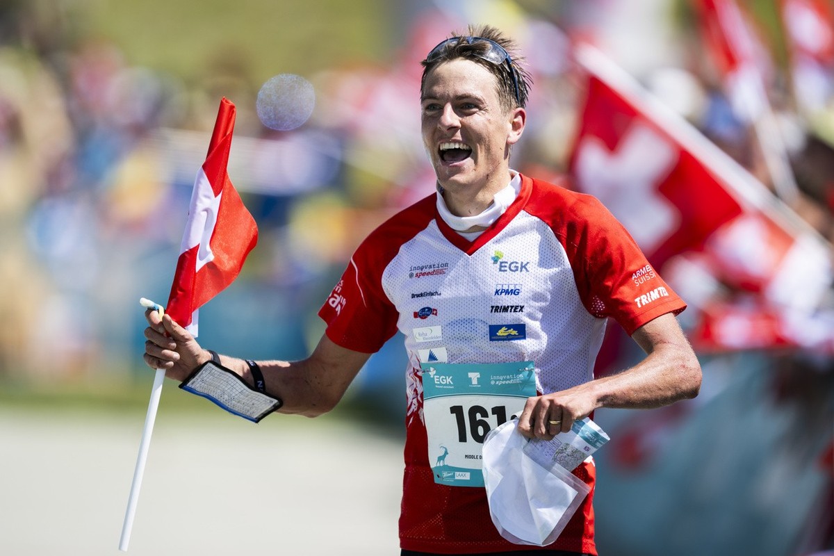 Winner Matthias Kyburz of Switzerland celebrates at the Orienteering World Championships middle distance race, on Saturday, July 15, 2023, in Flims/Laax, Switzerland. (KEYSTONE/Gian Ehrenzeller)