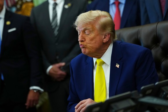 President Donald Trump listens at an event about coal, Thursday, June 4, 2026, in the Oval Office of the White House in Washington. (AP Photo/Julia Demaree Nikhinson)
Trump