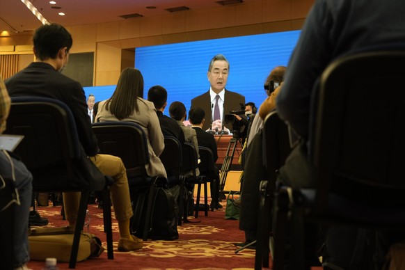 Chinese Foreign Minister Wang Yi speaks during a remote video press conference held on the sidelines of the annual meeting of China&#039;s National People&#039;s Congress (NPC) in Beijing, Monday, Mar ...