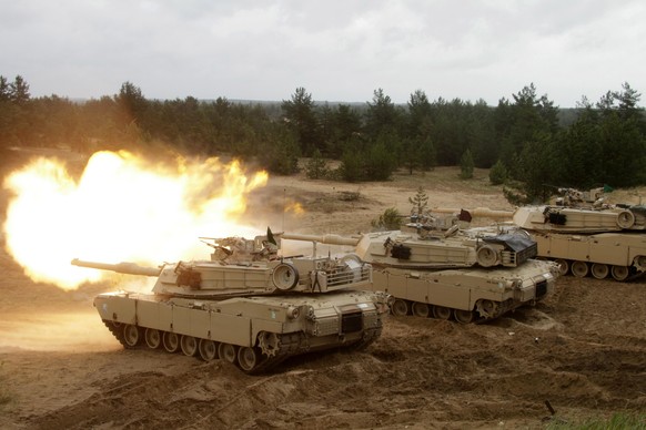 epa10429121 (FILE) - A US Army Abrams tank fires during the Saber Strike military exercises in Adazi military training area, Latvia, 11 June 2016 (reissued 25 January 2023). The US are to send some 31 ...