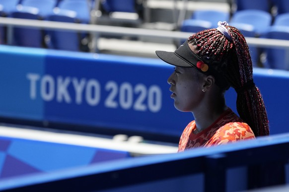 Naomi Osaka, of Japan, practices ahead of the 2020 Summer Olympics at Ariake Tennis Center, Monday, July 19, 2021, in Tokyo. (AP Photo/Kiichiro Sato)
Naomi Osaka