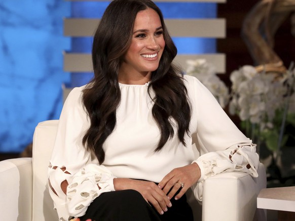In this photo released by Warner Bros., Meghan, The Duchess of Sussex, appears during a taping of &quot;The Ellen DeGeneres Show&quot; at the Warner Bros. lot in Burbank, Calif. (Michael Rozman/Warner ...