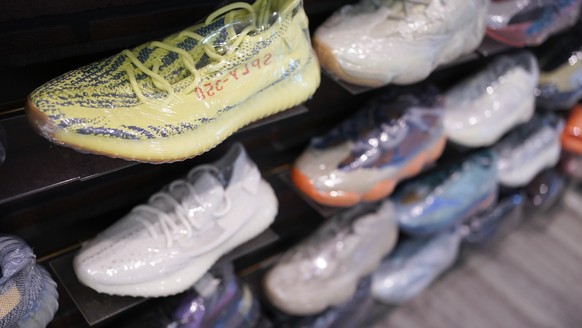 Yeezy shoes made by Adidas are displayed at Kickclusive, a sneaker resale store, in Paramus, N.J., Tuesday, Oct. 25, 2022. Adidas has ended its partnership with the rapper formerly known as Kanye West ...