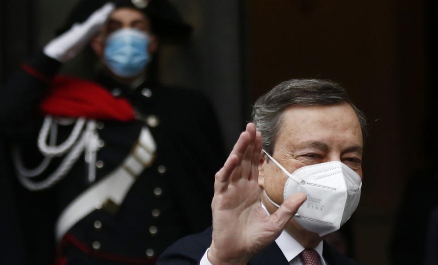 Italian Premier Mario Draghi arrives at the Senate in Rome, where he will seek a confidence vote Wednesday, Feb. 17, 2021. (Cecilia Fabiano/LaPresse via AP)