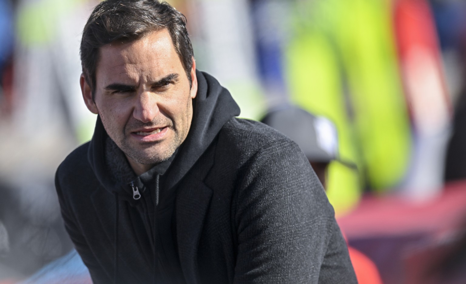 epa09803020 Swiss tennis player Roger Federer reacts in the stands during the Women&#039;s Super-G race at the FIS Alpine Skiing World Cup in Lenzerheide, Switzerland, 05 March 2022. EPA/GIAN EHRENZEL ...