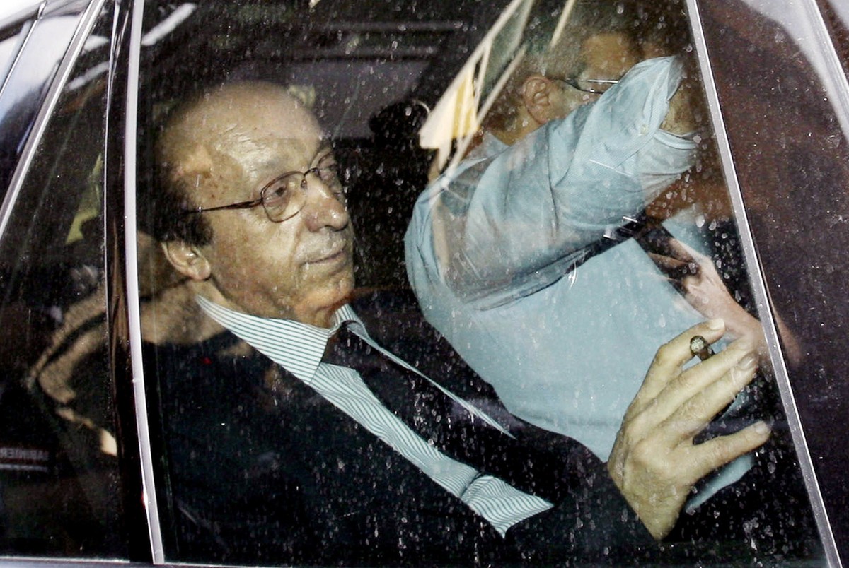 Juventus' soccer team General Manager Luciano Moggi leaves the Italian Carabinieri (para-military policemen) headquarters after being questioned following a match-fixing scandal that is rocking t ...