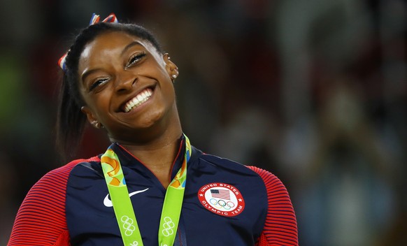 2016 Rio Olympics - Artistic Gymnastics - Final - Women&#039;s Floor Final - Rio Olympic Arena - Rio de Janeiro, Brazil - 16/08/2016. Gold medalist Simone Biles (USA) of USA reacts. REUTERS/Mike Blake ...