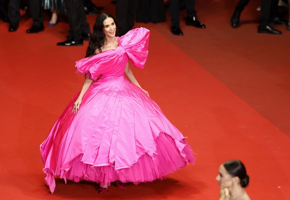 epa12965556 Jury Feature Films Jury Member Demi Moore attends the premiere of 'Paper Tiger' during the 79th annual Cannes Film Festival, in Cannes, France, 16 May 2026. The film festival run ...