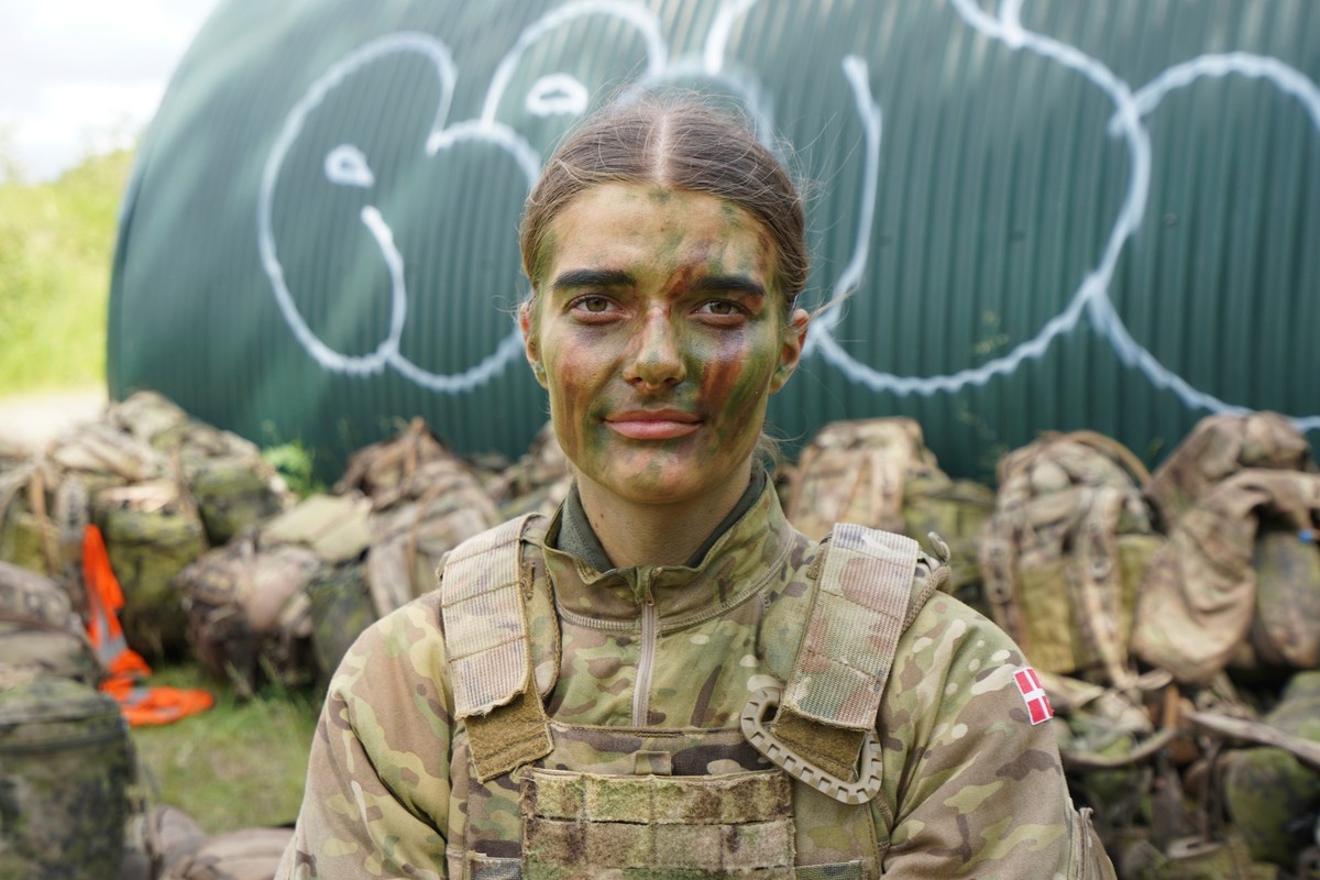 21-year-old conscript Anne Sofie poses for a photo during final exercises at a training area close to Royal Danish Army's barracks in Hovelte, 25 kilometres north of Copenhagen, Denmark, Wednesda ...