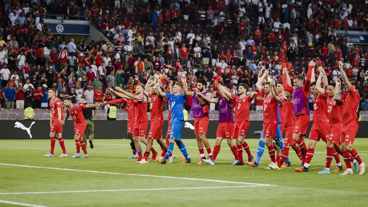 epa10010126 Switzerland's players celebrate winning the UEFA Nations League soccer match between Switzerland and Portugal at the Stade de Geneve stadium, in Geneva, Switzerland, 12 June 2022. EPA ...