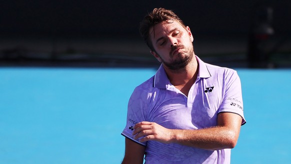 epa10408522 Stan Wawrinka of Switzerland reacts during the first round match against Alex Molcan of Slovakia at the Australian Open tennis tournament in Melbourne, Australia 16 January 2023. EPA/FAZRY ...