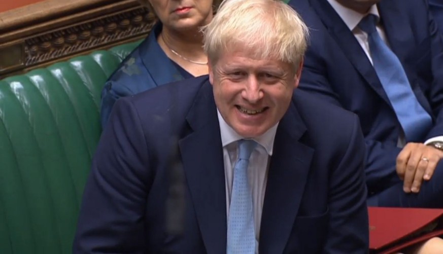 epa07891467 A grab from a handout video made available by the UK Parliamentary Recording Unit shows British Prime Minister Boris Johnson during a session at the House of Commons in London, Britain, 03 ...