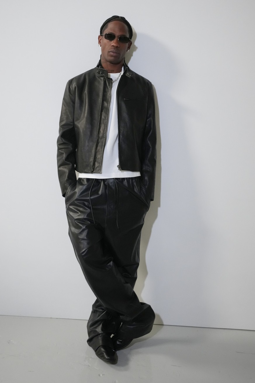 Travis Scott attends the Bottega Veneta women's Spring-Summer 2027 fashion show, presented in Milan, Italy, Saturday, Sept. 26, 2026. (AP Photo/Luca Bruno)
Travis Scott