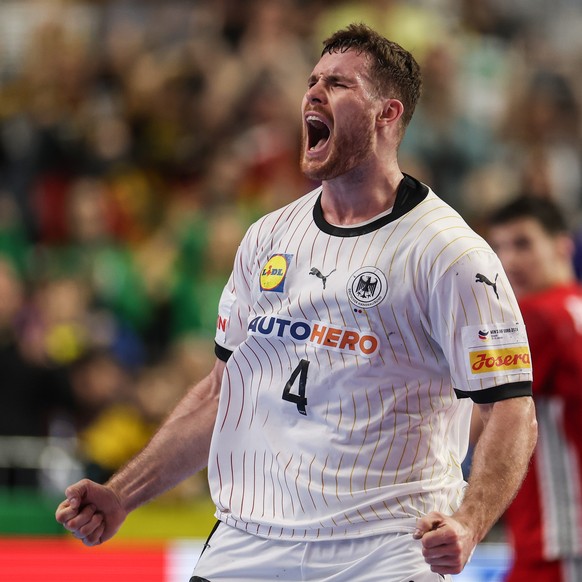 epa11097141 Germany&#039;s Johannes Golla celebrates after winning the EHF Men&#039;s EURO 2024 Main round group 1 handball match between Germany and Hungary in Cologne, Germany, 22 January 2024. EPA/ ...