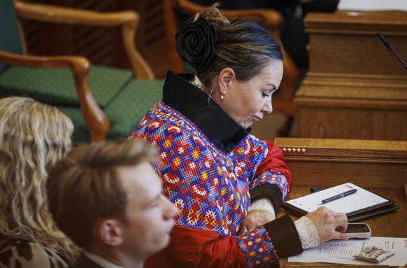 epa11635569 Greenlandic politician Aaja Chemnitz Larsen, representing the Inuit Ataqatigiit party, attends the opening of the Folketinget, the Danish Parliament, at Christiansborg Castle in Copenhagen ...