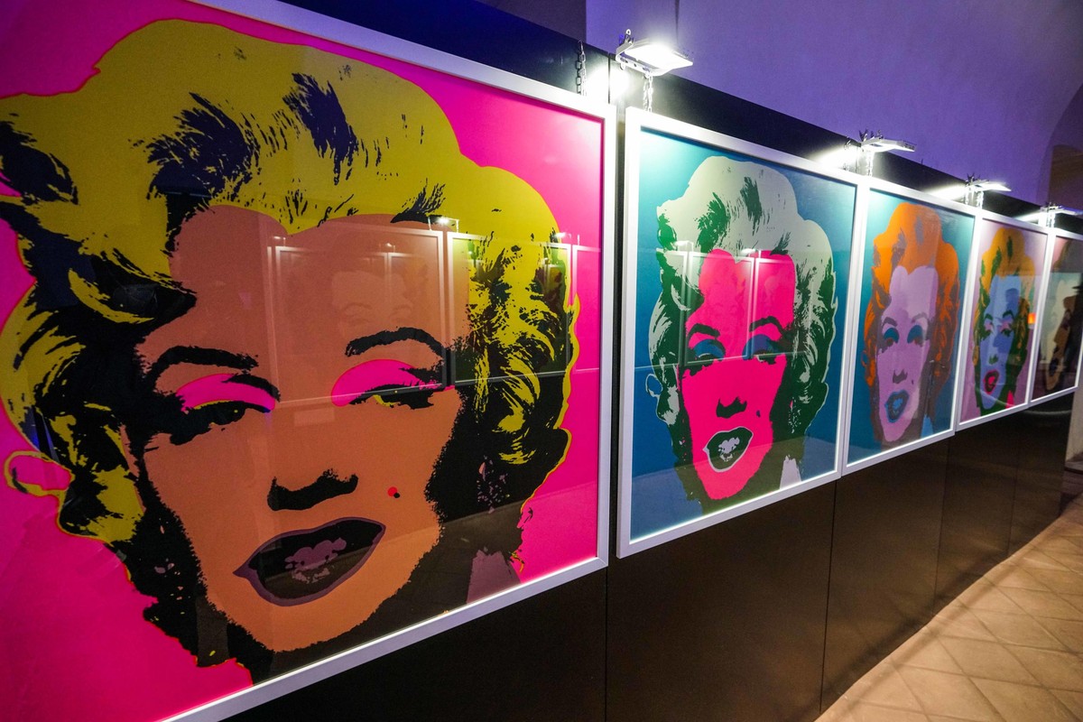 epa08768750 Portraits of US actress Marilyn Monroe by US artist Andy Warhol are on display in the Andy Warhol exhibition, entitled 'Super Pop,' in Nichelino, near Turin, Italy, 23 October 20 ...