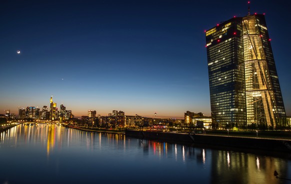 epa07136921 (FILE) - A general view of the Frankfurt city skyline on the left and European Central Bank ECB at sunset in Frankfurt Main, Germany, 18 April 2018 (reissued 02 November 2018). The Europea ...