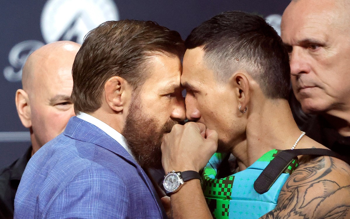 UFC welterweight fighters Conor McGregor, left, and Max Holloway face off during a news conference for the UFC 329 mixed martial arts event, Thursday, July 9, 2026, in Las Vegas. (Steve Marcus/Las Veg ...