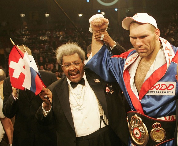 Title defender Nikolai Valuev from Russia, right, celebrates with promoter Don King after the WBA heavyweight championship fight against Jameel McCline from the U.S. at the St. Jakobshalle indoor aren ...