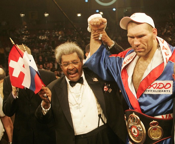 Title defender Nikolai Valuev from Russia, right, celebrates with promoter Don King after the WBA heavyweight championship fight against Jameel McCline from the U.S. at the St. Jakobshalle indoor aren ...