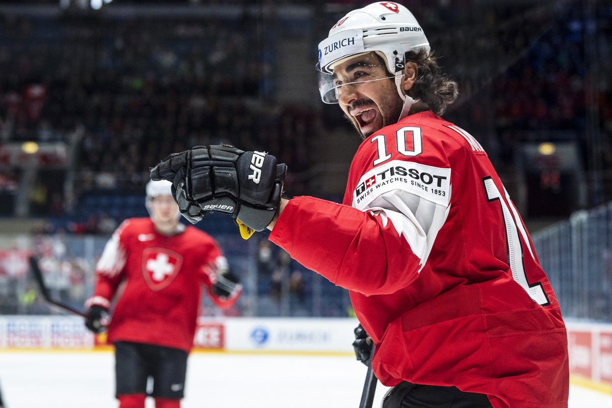 epa07572967 Switzerland's Andres Ambuehl celebrates after scoring the 1-0 lead during the IIHF World Championship group B ice hockey match between Switzerland and Norway at the Ondrej Nepela Aren ...