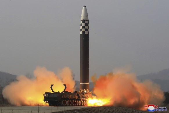 FILE - This photo distributed by the North Korean government shows what it says a test-fire of a Hwasong-17 intercontinental ballistic missile (ICBM), at an undisclosed location in North Korea on Marc ...