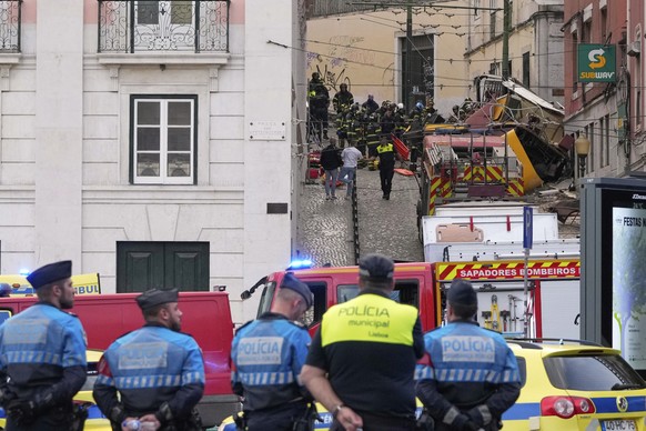 Emergency teams work at the site of a derailed electric streetcar in Lisbon, Portugal, Wednesday, Sept. 3, 2025. (AP Photo/Armando Franca)
Portugal Funicular Derails