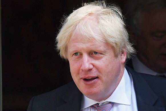epa06875620 (FILE) - British Foreign Secretary Boris Johnson departs Downing Street following a cabinet meeting in London, Britain, 03 July 2018, (reissued 09 July 2018). Media reports on 09 July 2018 ...