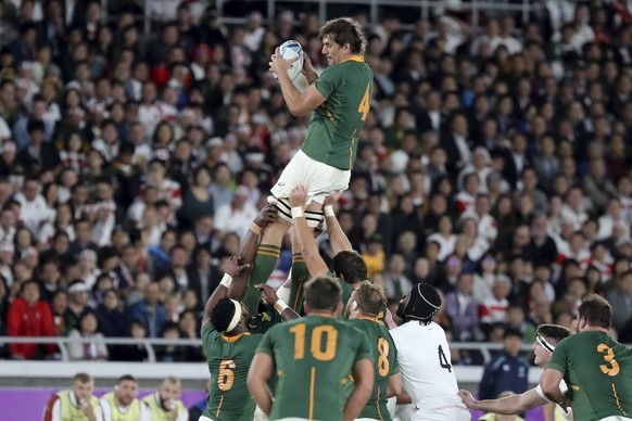 South Africa's Eben Etzebeth catches a ball in a lineout during the Rugby World Cup final between England and South Africa at International Yokohama Stadium in Yokohama, Japan, Saturday, Nov. 2, 2019. (AP Photo/Eugene Hoshiko)