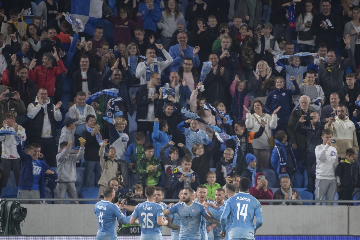 Slovan players celebrate Vladimir Weiss's goal from a penalty Europa Conference League group H soccer match between SK Slovan Bratislava and FC Basel in Bratislava, Slovakia, on Thursday, Oct. 13 ...
