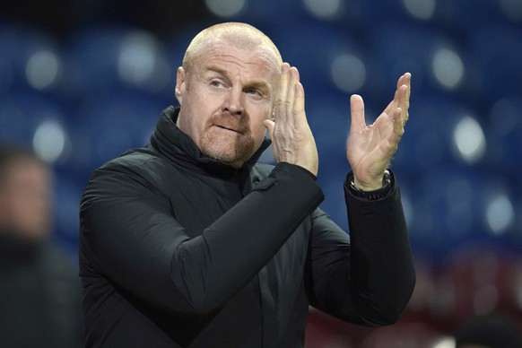 FILE - Burnley's manager Sean Dyche applauds the fans prior to the start of the English Premier League soccer match between Burnley and Leicester City at Turf Moor stadium in Burnley, England on March ...