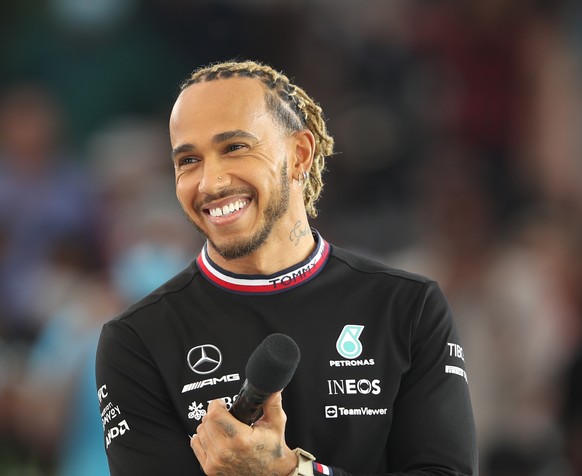 epa09824190 British Formula One driver Lewis Hamilton of Mercedes talks at Al Wasl Dome during the EXPO 2020 in Dubai, United Arab Emirates, 14 March 2022. EPA/ALI HAIDER