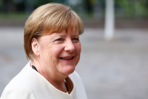 epa11362292 Former German Chancellor Angela Merkel arrives to attend an ecumenical service in St. Mary&#039;s Church on the occasion of the 75th anniversary of the proclamation of the Basic Law, in Be ...