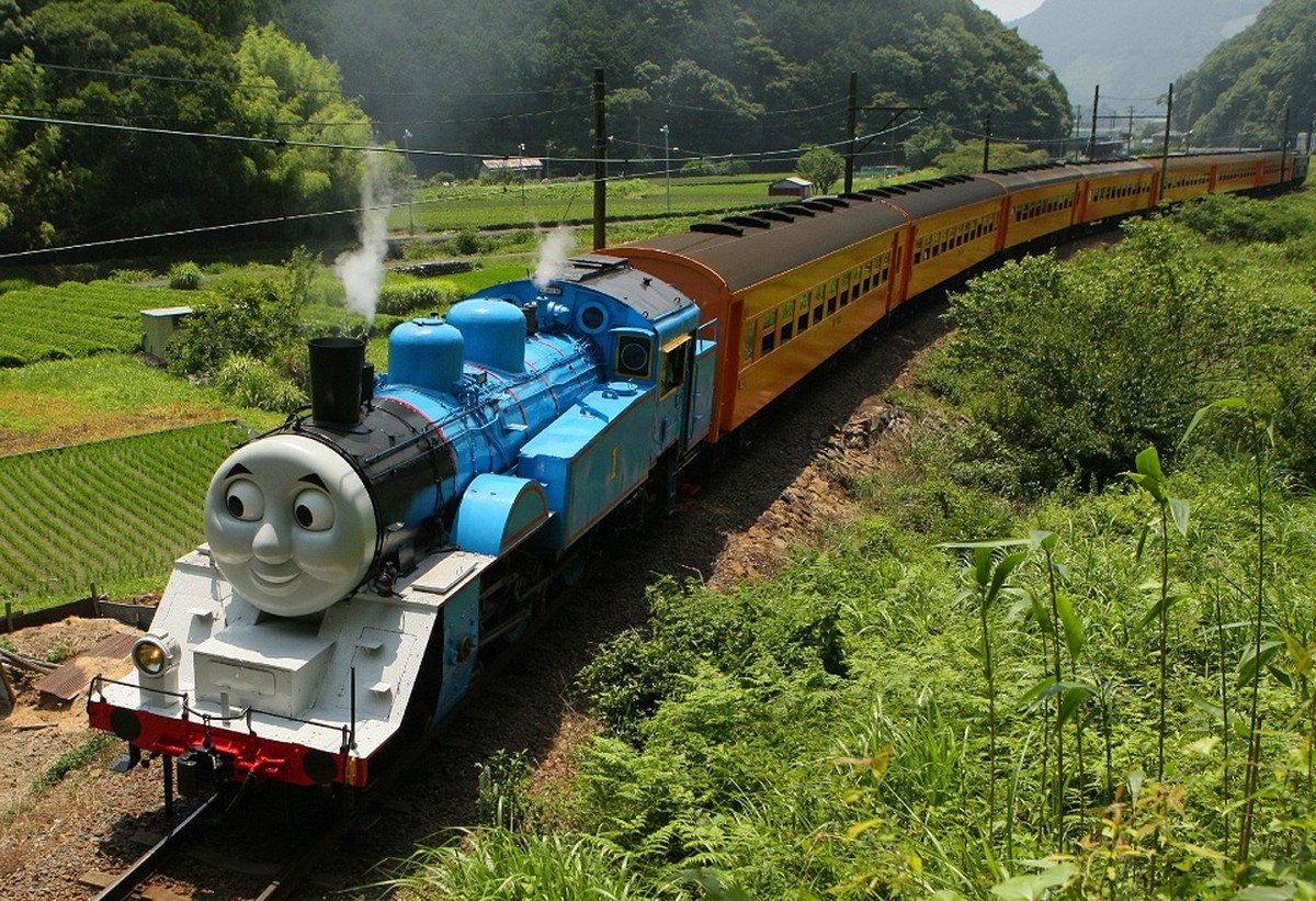 This picture taken on July 2, 2014 shows a life-sized Thomas the Tank Engine making a test run in the mountains on a line run by Japan's Oigawa railway near the city of Shimada in Shizuoka prefec ...