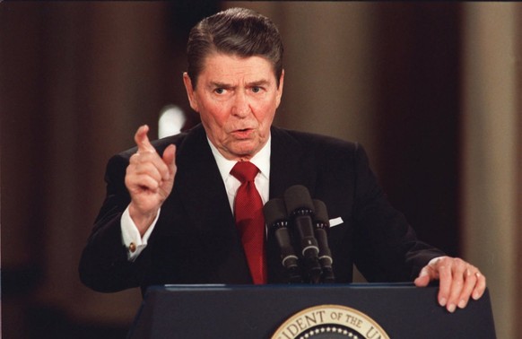 ** FILE ** President Reagan gives a news conference at the White House March 20,1987. Reagan said he never deliberately lied to the public, although he admitted to a misstatment about Israeli involvem ...