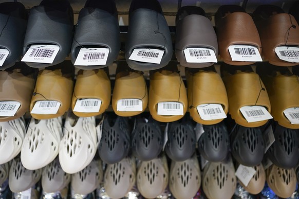 Yeezy shoes made by Adidas are displayed at Laced Up, a sneaker resale store, in Paramus, N.J., Tuesday, Oct. 25, 2022. Adidas has ended its partnership with the rapper formerly known as Kanye West ov ...
