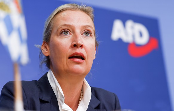 epa10909017 Alternative for Germany (AfD) co-chairwoman Alice Weidel attends a news conference after the state elections in Hesse and Bavaria, in Berlin, Germany, 09 October 2023. EPA/HANNIBAL HANSCHK ...