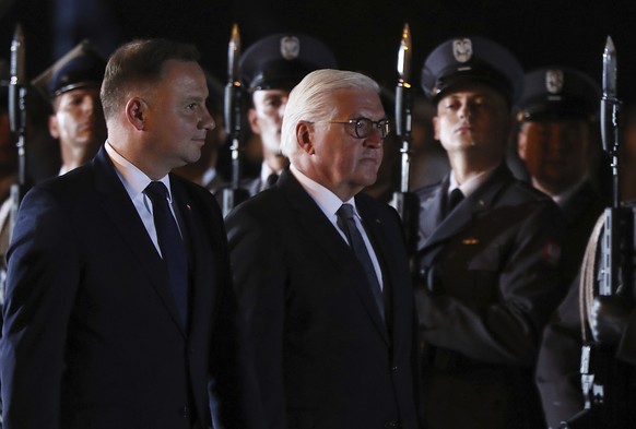German President Frank-Walter Steinmeier, right, and Polish President Andrzej Duda, left, attend ceremony marking the 80th anniversary of World War II, in Wielun, Poland, Sunday, Sept. 1, 2019. (AP Ph ...