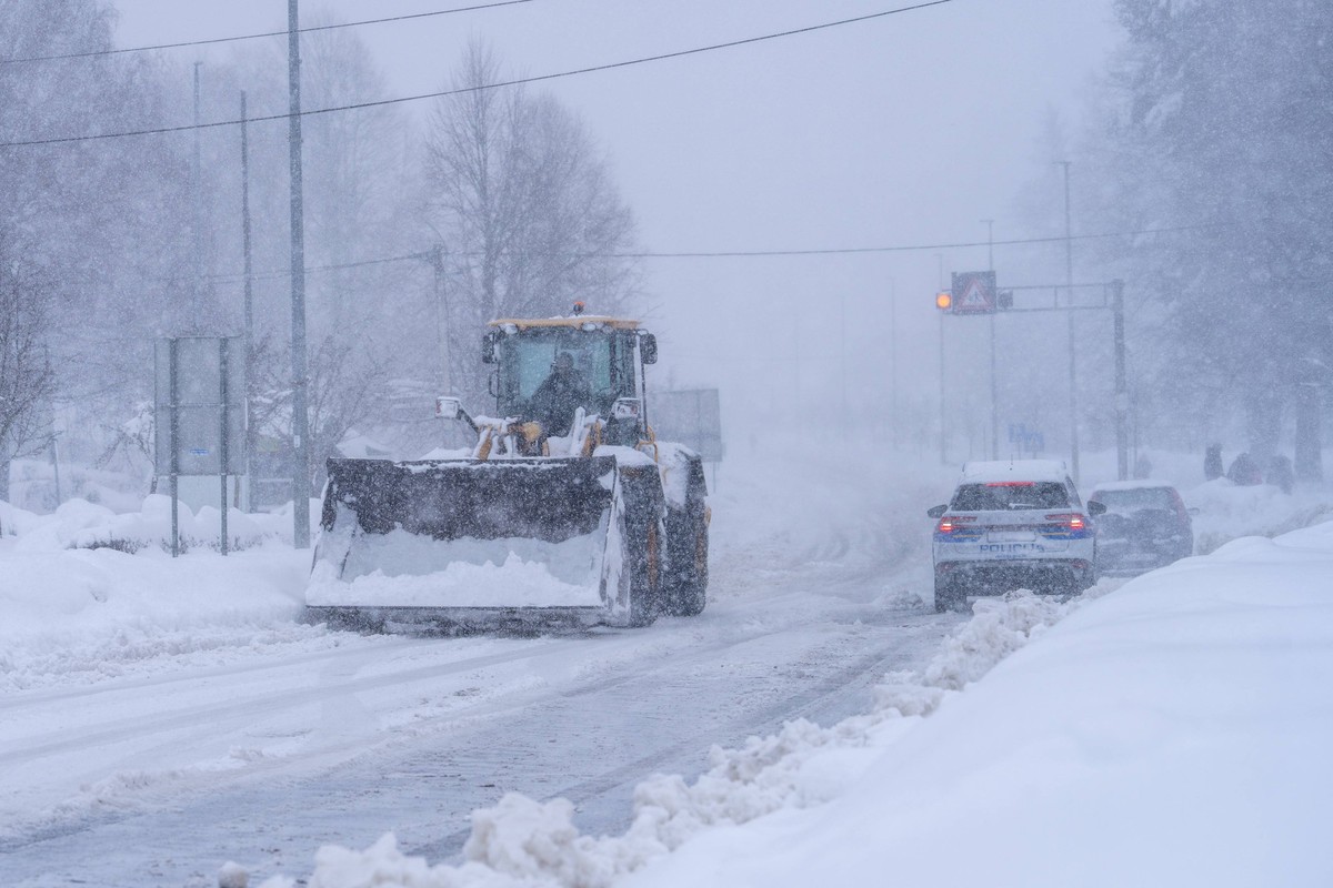 Heavy snowstorm and strong winds disrupt traffic in Korenica Snowplows clear roads during a severe snowstorm in Korenica, Croatia, on March 27, 2026, as heavy snow and strong winds cause significant t ...