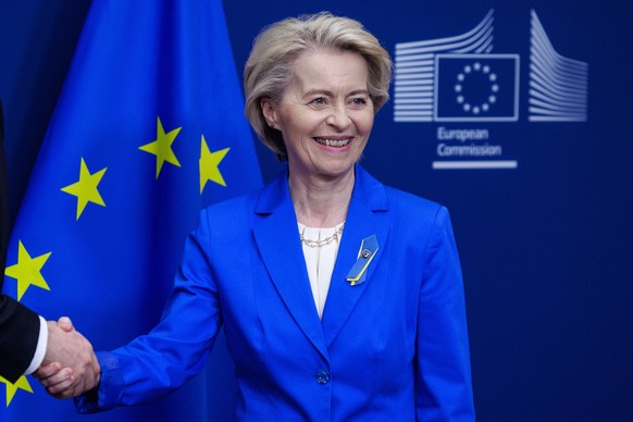 epa12022162 EU Commission President Ursula von der Leyen (R) shakes hands with the Ukrainian prime minister during their meeting in the EU Commission building in Brussels, Belgium, 10 April 2025. EPA/ ...