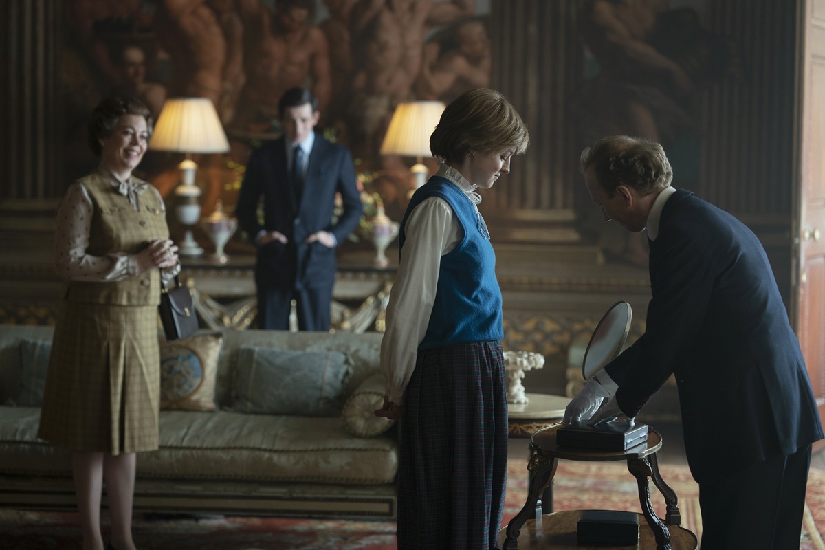 This image released by Netflix shows Olivia Colman, from left, Josh O'Connor and Emma Corrin in a scene from "The Crown." Season four premieres on Sunday, Nov. 15. (Des Willie/Netflix v ...
