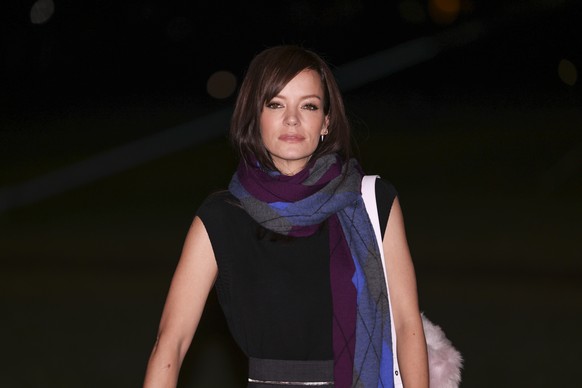 Lily Allen poses for photographers upon arrival at the Burberry Winter 2024 fashion show on Monday, Feb. 19, 2024 in London. (Photo by Vianney Le Caer/Invision/AP)
Lily Allen