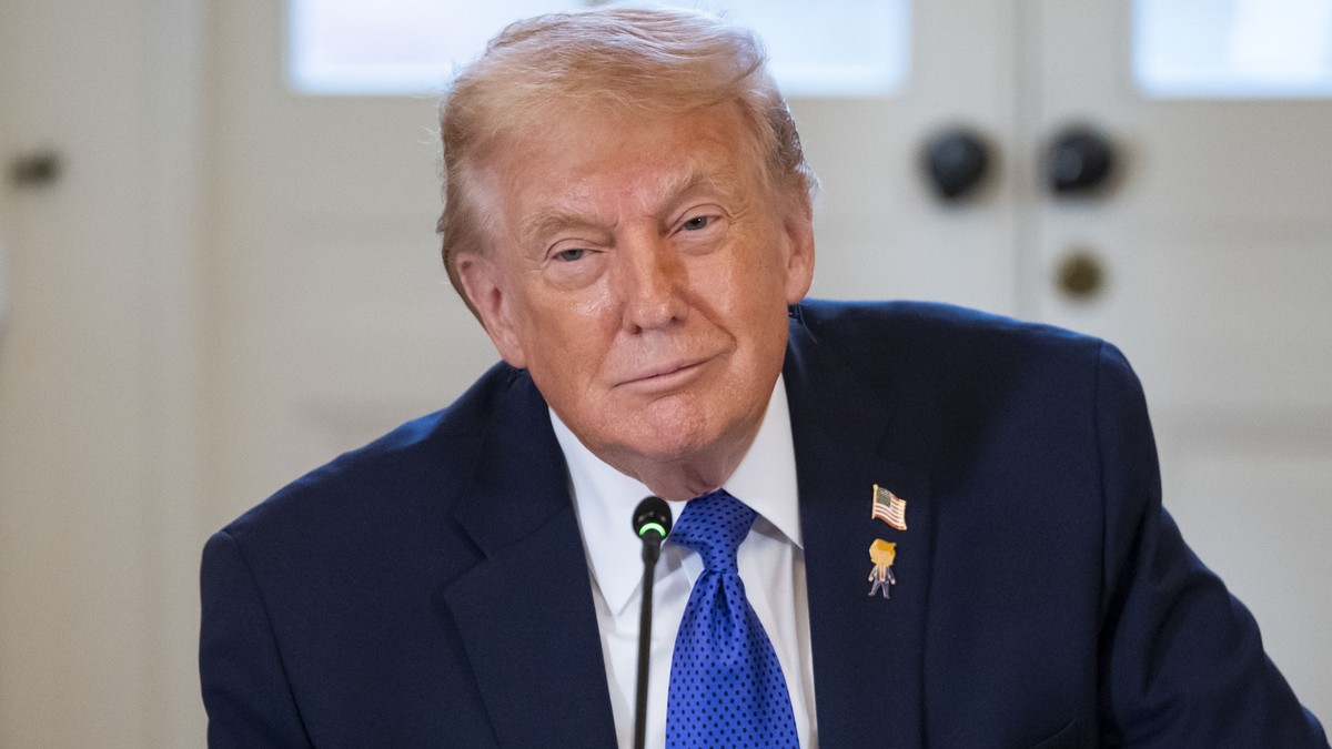 epa12639388 US President Donald Trump looks on during a meeting with oil and gas executives in the East Room of the White House in Washington, DC, USA, 09 January 2026. The meeting included executives ...